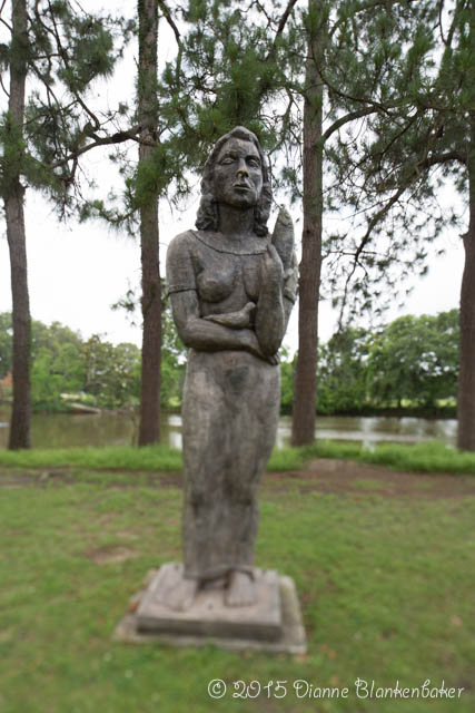Shooting this sculpture relatively close on a tilt yields a sharp face and blurred legs.